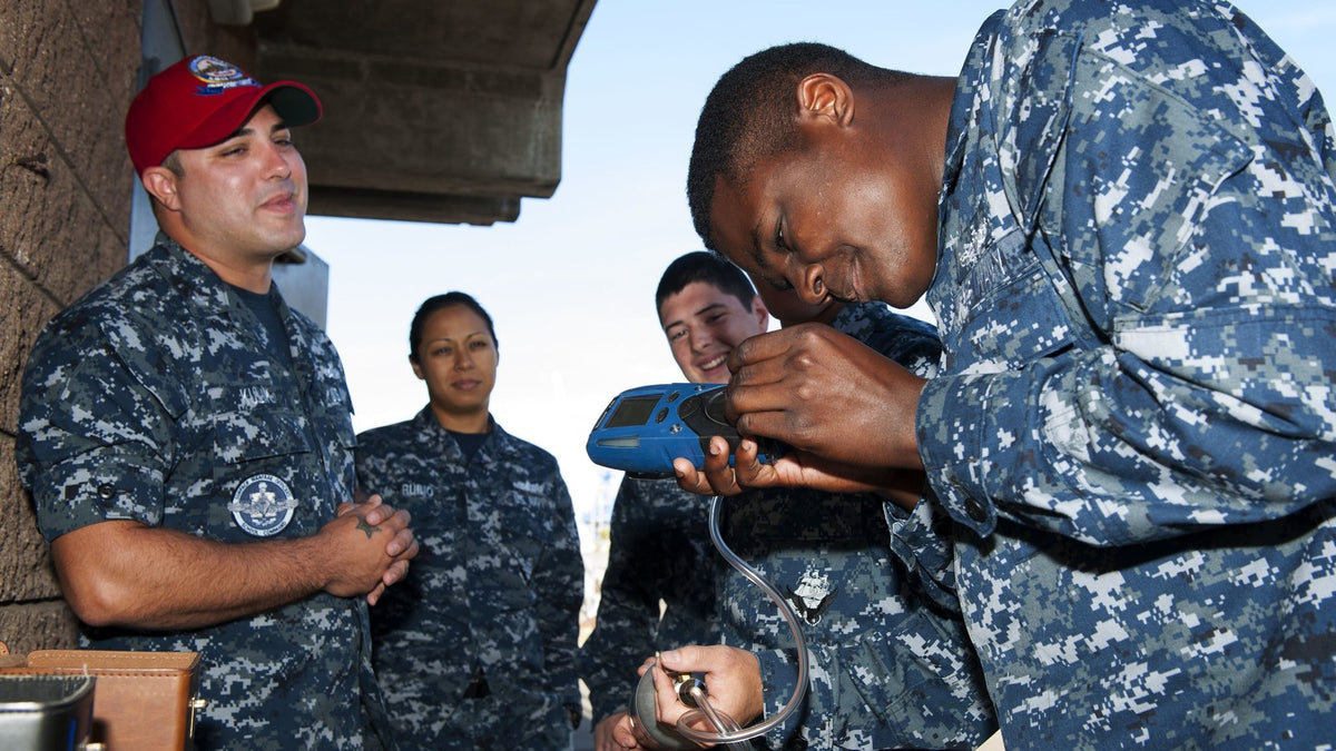 Trainee testing a portable confined-space gas detector
